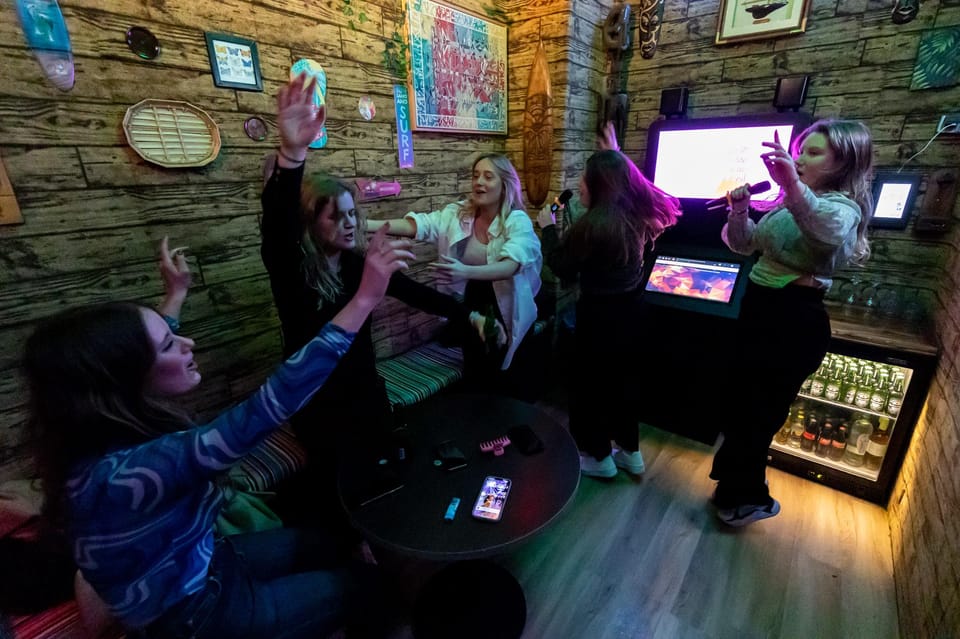 Aloha Amsterdam: Private Karaoke Booth with 20.000 Songs - Where to Meet by the Riverside (and Why That Matters)