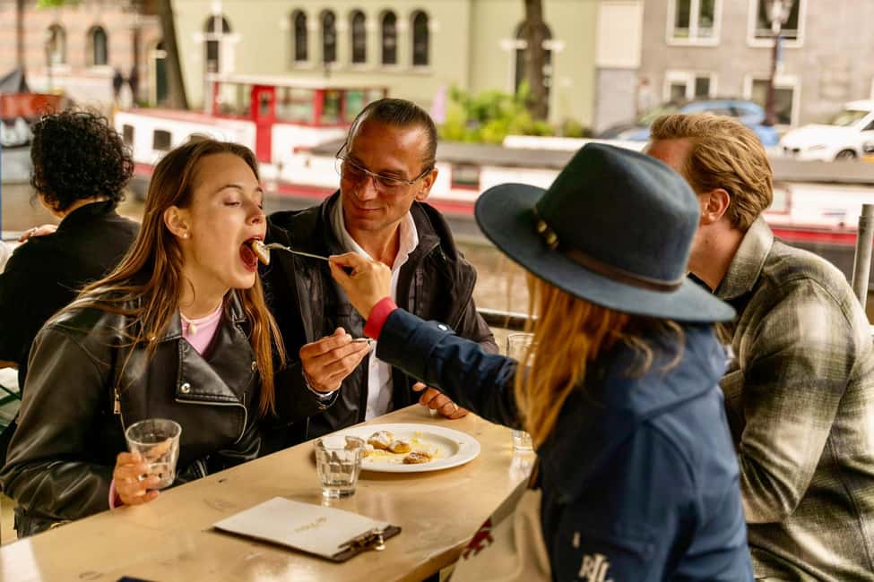 Amsterdam: 10 Tastings Guided Food Tour by UNESCO Canals - Spui Square guided segment: short walk, big context