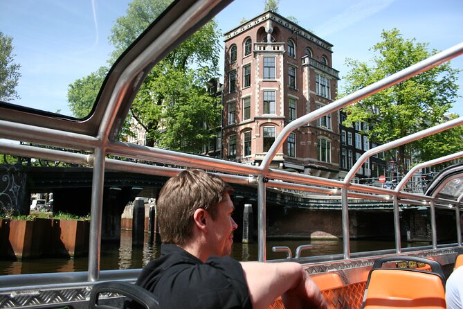 Amsterdam 1h Canal Cruise by Semi-Open Boat with Audio Guide - The Audio Guide Reality Check: Enjoy the Commentary or You’ll Miss It