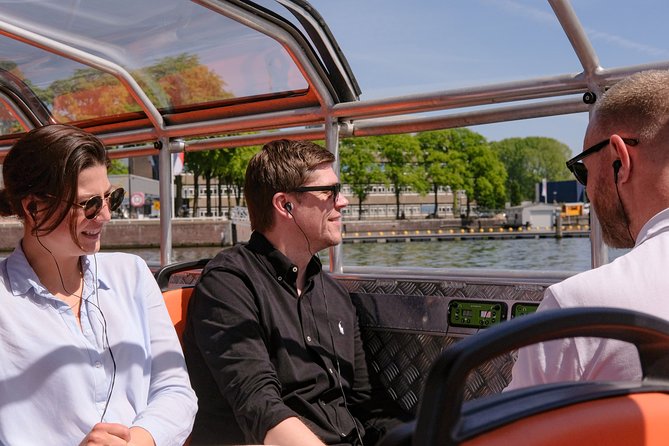 Amsterdam 1h Canal Cruise by Semi-Open Boat with Audio Guide - Red Light District Views From the Water (Without the Street Drama)