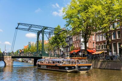 Amsterdam 1h Canal Cruise by Semi-Open Boat with Audio Guide - Canal-Belt Architecture: Merchant Houses, Narrow Fronts, and Gables