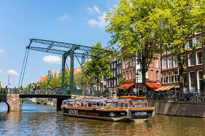 Amsterdam 1h Canal Cruise by Semi-Open Boat with Audio Guide - Canal-Belt Architecture: Merchant Houses, Narrow Fronts, and Gables