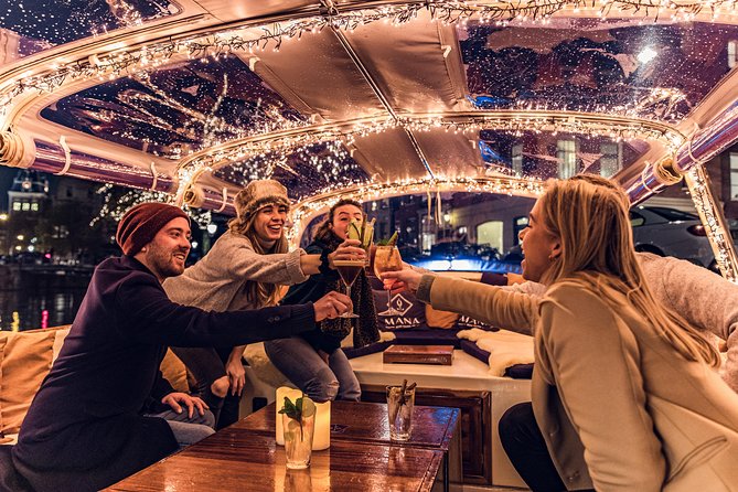 Amsterdam 2-Hour Evening Cruise With Live Guide and Bar - The canal ring highlights: Stopera, quiet waterways, and the Skinny Bridge