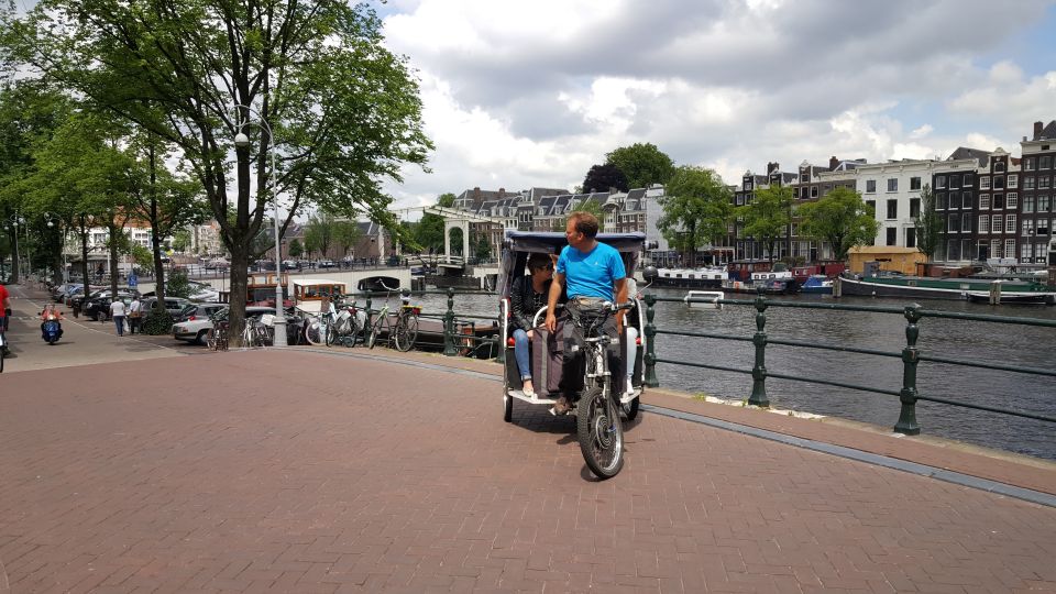 Amsterdam: 2-Hour Sightseeing Tour by Rickshaw - Passing the Red Light District and coffee-shop streets