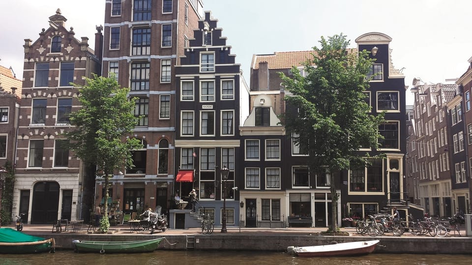 Amsterdam: 3-Hour Private Bike Tour of the City Center - Jordaan by bike: art galleries, small streets, and market energy