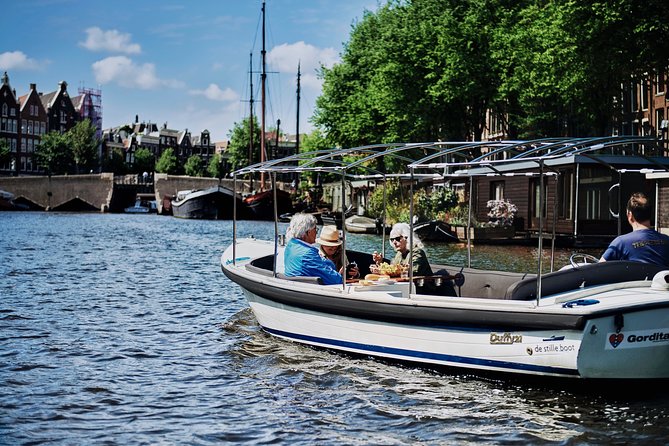 Amsterdam: 60-Minute Guided Private Canal Cruise with Drinks - The 17th-Century Canal Belt: UNESCO Views and Golden-Age Merchants