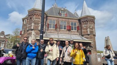 Amsterdam All In One Tour Walking Tour - Dam Square and the Royal Palace: where Amsterdam shows off and argues