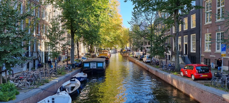 Amsterdam All In One Tour Walking Tour - Canals and UNESCO architecture: how Amsterdam rose from water