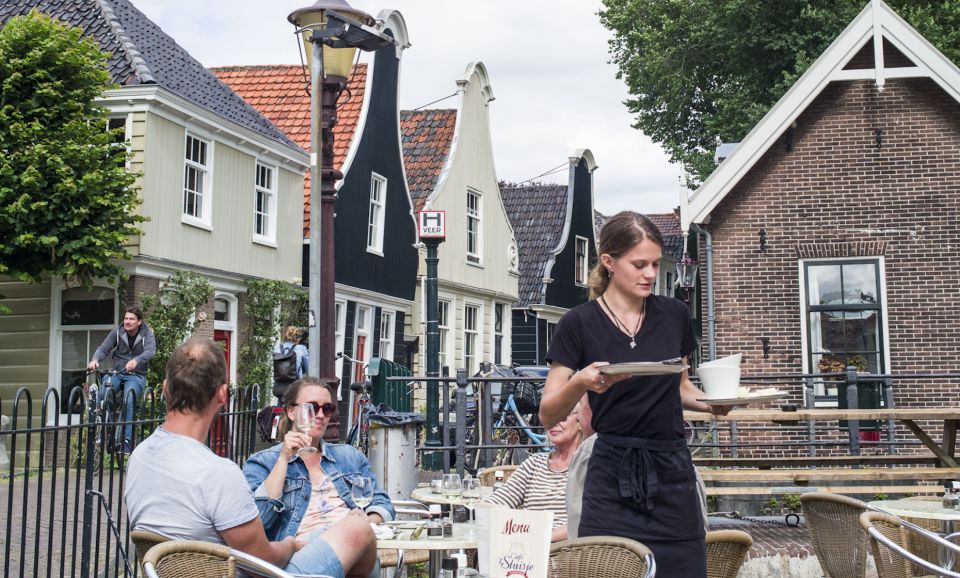 Amsterdam: Bike Tour (Noord) in German or English - Sea Palace Restaurant, the IJ River ferry, and getting your bearings fast