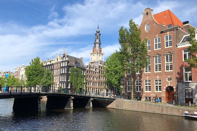Amsterdam Canal Cruise with German Guide and unlimited drinks - The Old Harbour Story: Trade That Built Amsterdam’s Wealth