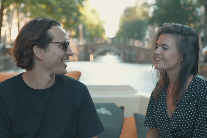 Amsterdam Canal Cruise with German Guide and unlimited drinks - Houseboats and the Calm Canal Flair