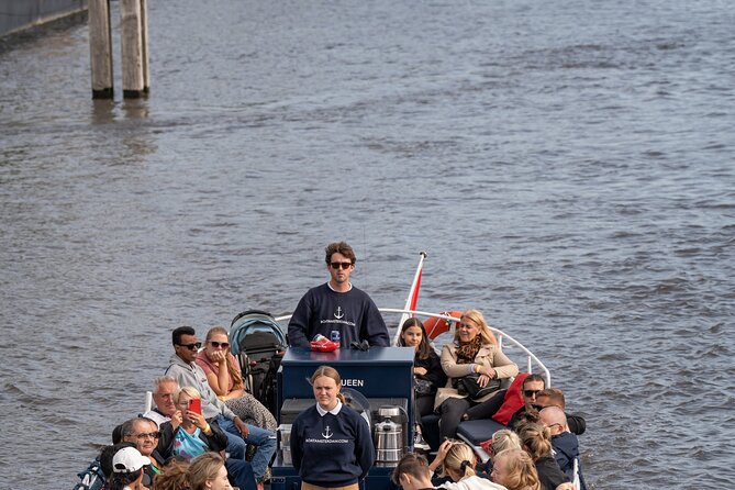 Amsterdam Canal Cruise with Live guide & Two drinks - Central St. - The Old City Centre route: canals, landmarks, and the red-light district angle
