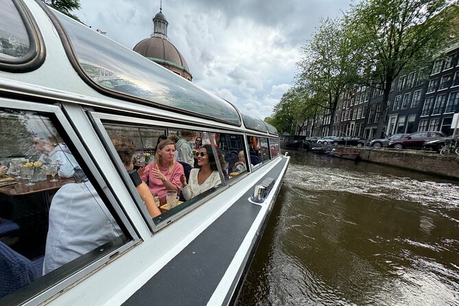 Amsterdam Cheese and Wine Canal Cruise - A 1-hour canal cruise that turns snacks into a city lesson