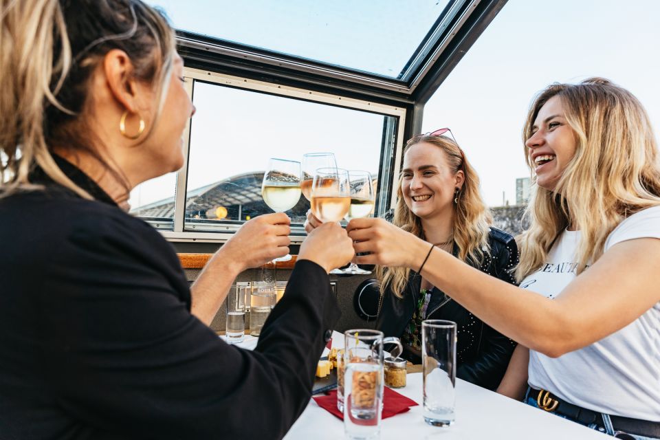 Amsterdam: Cheese & Wine Cruise Tasting Experience - Canal Belt Sights: From Prinsengracht to the Houseboat View