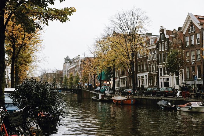 Amsterdam City Center Guided Walking Tour Semi-Private 12ppl Max - Start at St. Nicholas Basilica: religion, architecture, and a “why now” moment