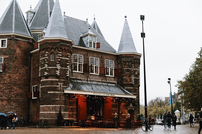 Amsterdam City Center Guided Walking Tour Semi-Private 12ppl Max - Nieuwmarkt and De Waag: old city gate energy in the middle of the action