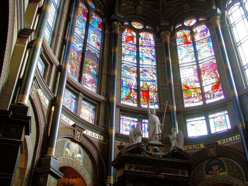 Amsterdam: City Highlights Walking Tour - Basilica of Saint Nicholas: The Biggest Roman Catholic Church in Amsterdam