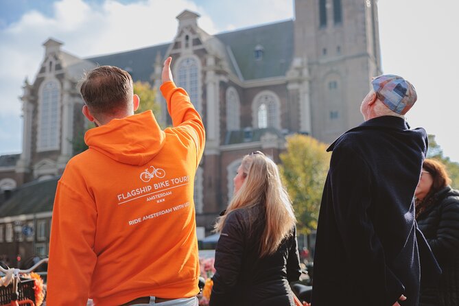 Amsterdam City Top Highlights Guided Bike Tour - Leidseplein and Dam Square: Amsterdam’s public-life core in two short hits