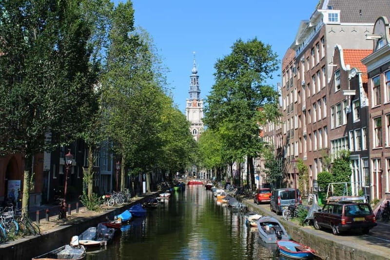 Amsterdam: City walking experience with a local - Entering Amsterdam on foot, with a local who links old and new