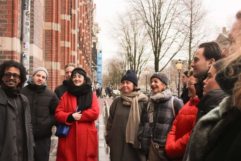 Amsterdam: City walking experience with a local - Meeting at Beursplein: quick to find, built for walking pace