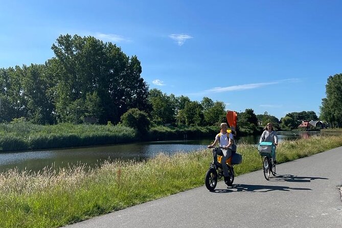 Amsterdam Countryside Bike and Kayak Tour - Stop 3: Watergang Village Break, Church Lunch Time, and Wetland Kayaking