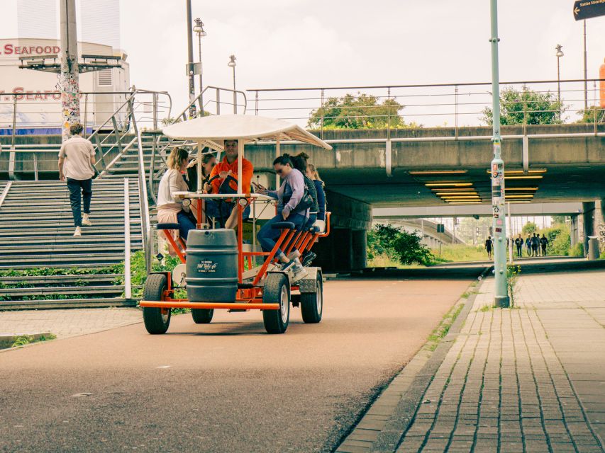 Amsterdam: Dutch Beer Bike Blast Tour with Onboard Bar - The Coffeeshop Sloterdijk stop: a short break, shopping-style