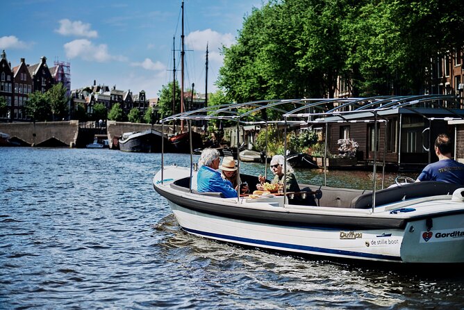 Amsterdam Essence in German: 90-minute waterway trip - Meet at Prinsengracht 375 and Start Where the City Looks Best