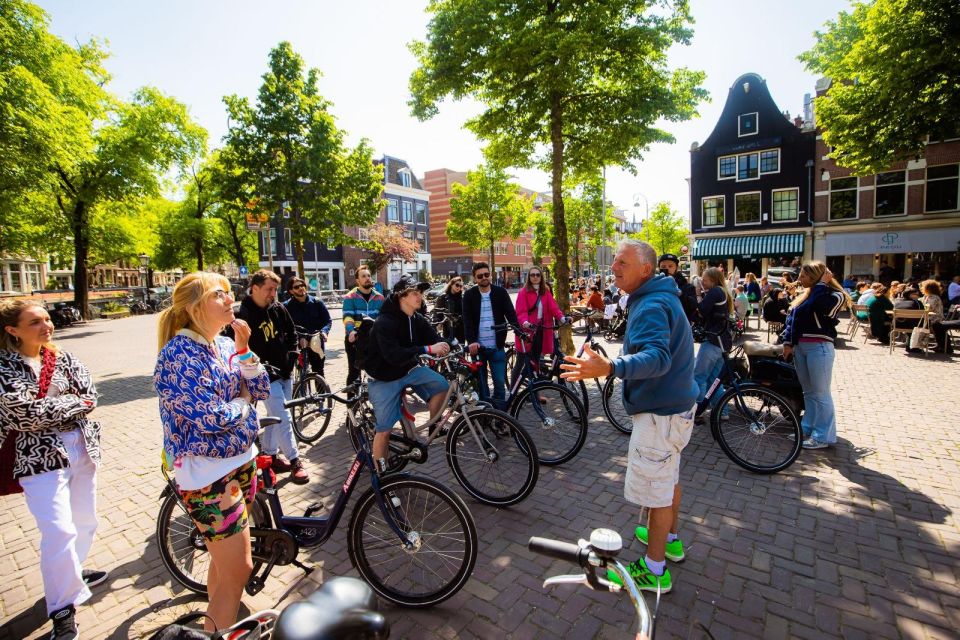 Amsterdam: Explore the City Highlights by Bike - Anne Frank House exterior and Skinny Bridge: iconic views, no ticket push