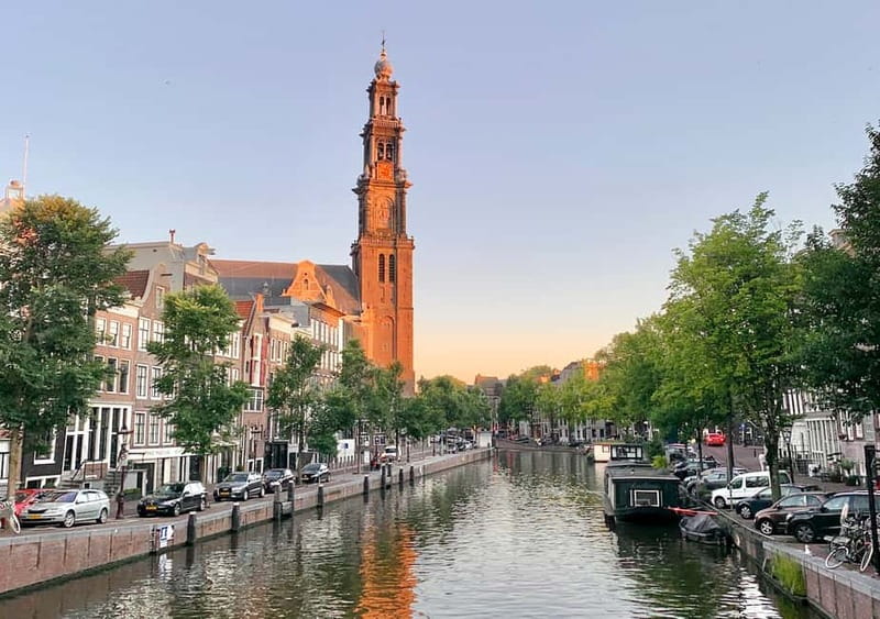 Amsterdam: German Canal Cruise with Unlimited Drinks Option - Stop-by-stop breakdown: NEMO to the Portuguese Synagogue and the Jewish Quarter