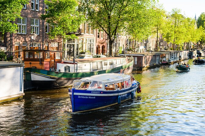 Amsterdam: German-speaking boat trip with bar on board - Key highlights you’ll care about