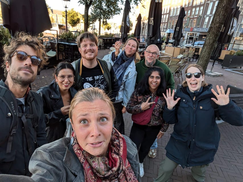 Amsterdam: Ghastly Grachten: ghost stories&dark history tour - Torensluis Bridge: Where the Night Walk Starts Feeling Cinematic