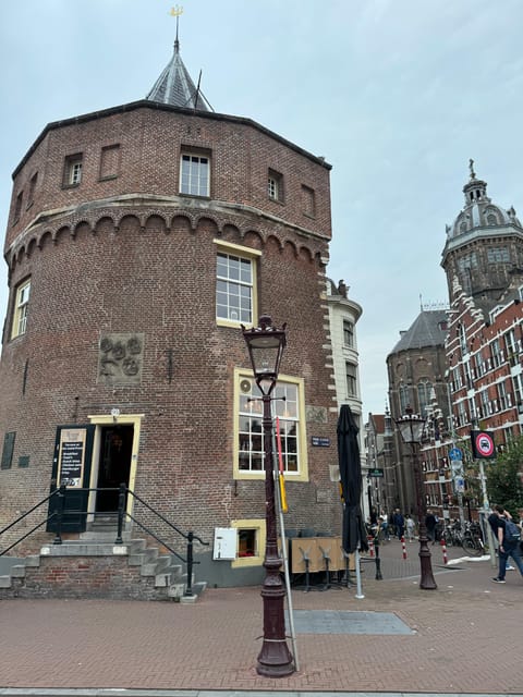 Amsterdam: Ghost Walking Tour and Dark History - Begijnhof: a peaceful courtyard with unsettling stories attached