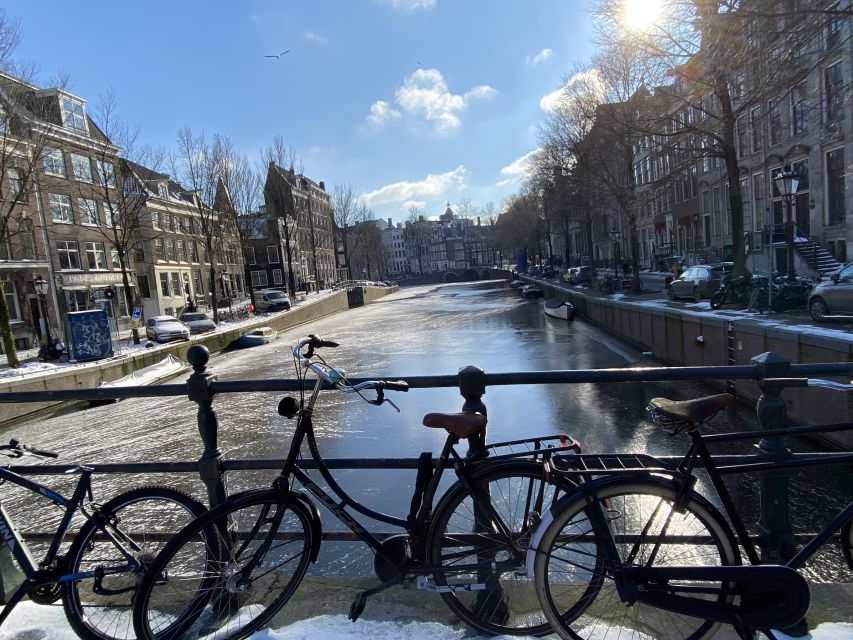 Amsterdam: Guided Off-The-Beaten-Track Walking Tour - Entering The Route: Beursplein To Dam, With Fast City-Wiring
