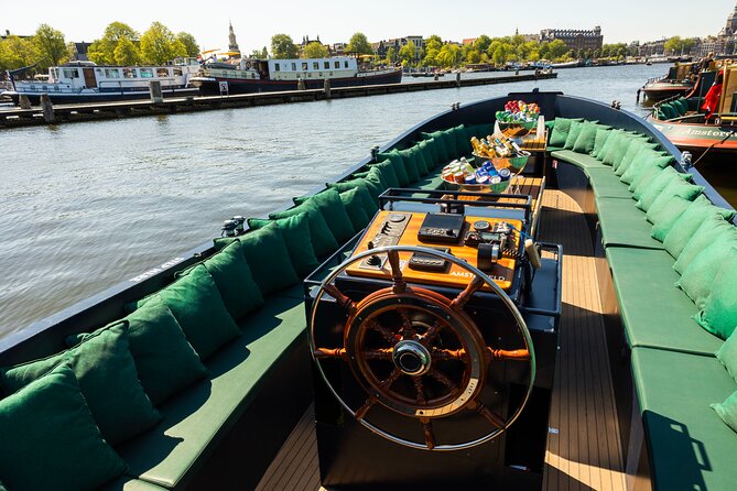 Amsterdam: Guided Open Boat Canal Cruise Unlimited Drinks Option - Key things to know before you go