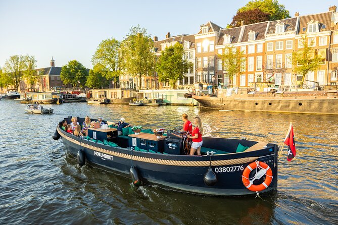 Amsterdam: Guided Open Boat Canal Cruise Unlimited Drinks Option - The Route from Pierre Cuypers to the Jordaan: What You’ll See in One Hour