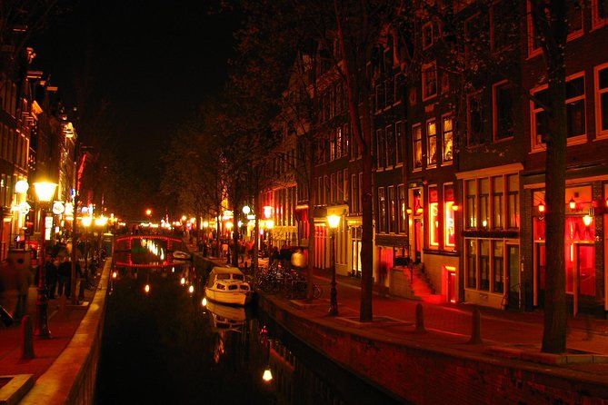 Amsterdam: Guided Red Light District and City Walking Tour - Old Town streets and the Red Light District area you’ll hear explained