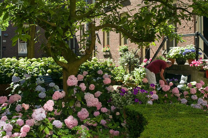 Amsterdam: Hidden Gems Walking Tour in German - Religion’s changing role: Hofje Van Brienen and Karthuizerhof’s garden quiet