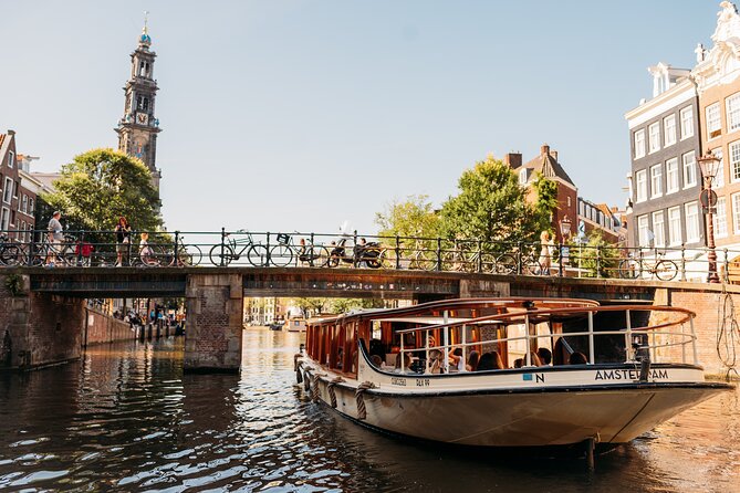 Amsterdam Historic Tour On Classic Saloon Boat - Onboard comfort: a luxury saloon boat, plus blankets and a bar