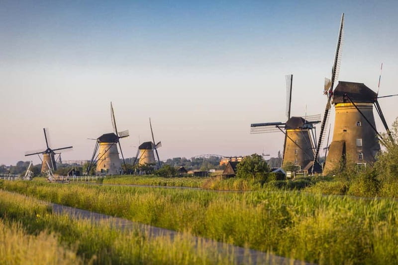 Amsterdam: Kinderdijk, Euromast, Delft and Den Haag Day Tour - Guiding and pacing: why Adrian and Simon-style service matters