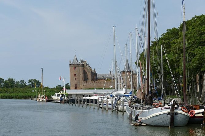 Amsterdam Landscape Windmill Private Bike Tour - Weesp by bike: canals, houseboats, defense lines, and that skinny-bridge moment