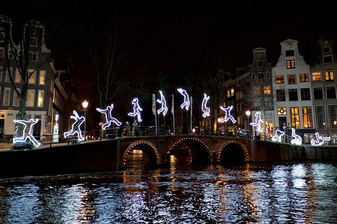Amsterdam Light Festival Canal Cruise + Unlimited Drinks Option - On-board comfort: heated cabin, commentary, and the pace