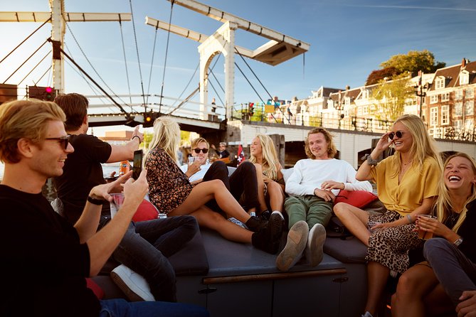 Amsterdam Light Festival: Saloon Boat Cruise + Hot Drinks & Bite - Setting Off From the National Maritime Museum Area