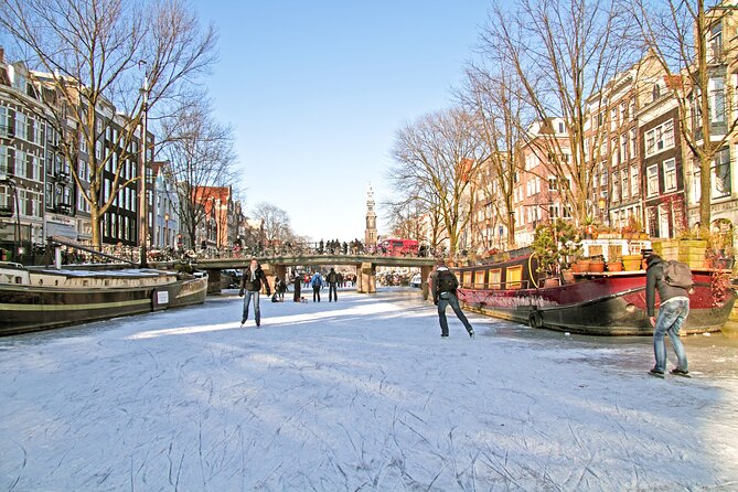 Amsterdam Light Festival Winter Walk with Stroopwafel Workshop - Meeting at Dam Square: Your Quick Start Point