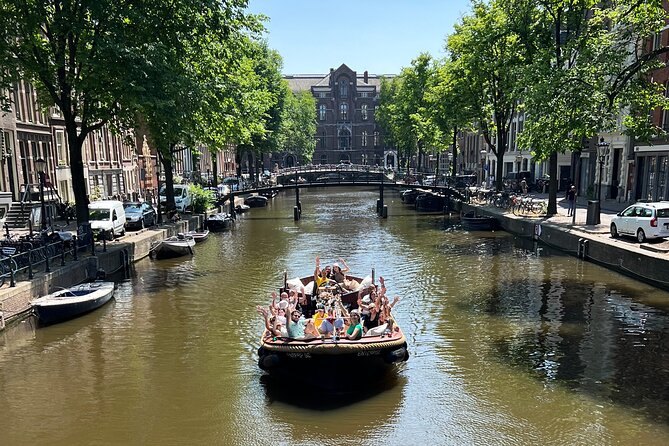 Amsterdam Luxury Boutique Boat tour with Unlimited Beer and Wine - Where You Meet and How the Ride Starts