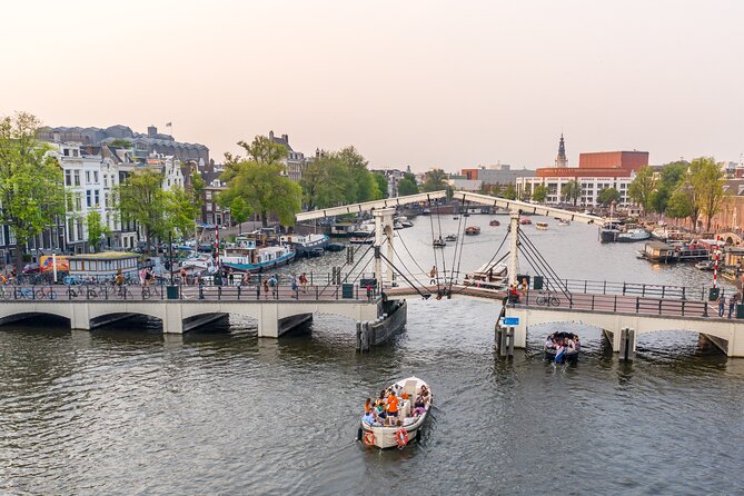 Amsterdam Luxury Canal Cruise + Unlimited Drinks & Bites option - Your route through Jordaan, Prinsengracht, and the “15 bridges” photo stop