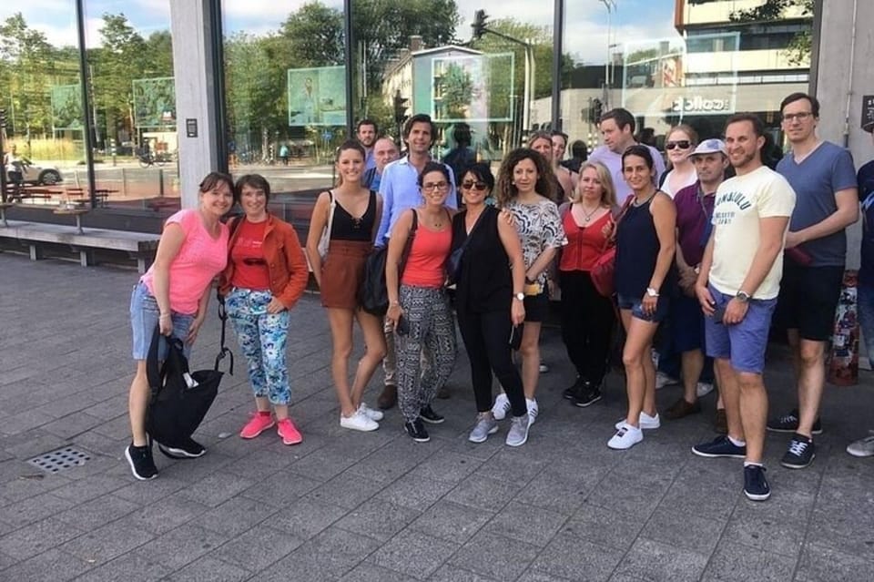 Amsterdam: Must-See Attractions Guided Walking Tour - Portuguese Synagogue and Nieuwmarkt Square: Faith, Trade, and Street Life