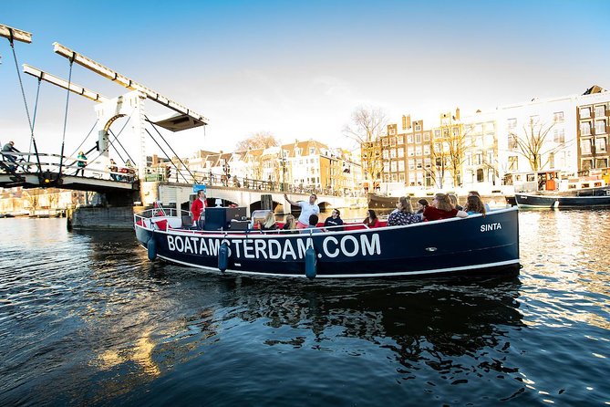 Amsterdam Open Boat Cruise in Old City Center with Live Guide - Why this open-air canal cruise fits Amsterdam so well