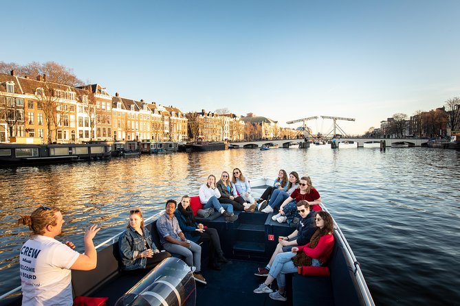 Amsterdam Open Boat Cruise in Old City Center with Live Guide - Live English guide: what you’re gaining beyond the view