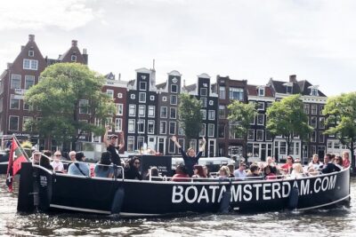 Amsterdam Open Boat Cruise in Old City Centre with Drinks Options - What you see in 1 hour: Amstel, UNESCO canals, and bridge after bridge