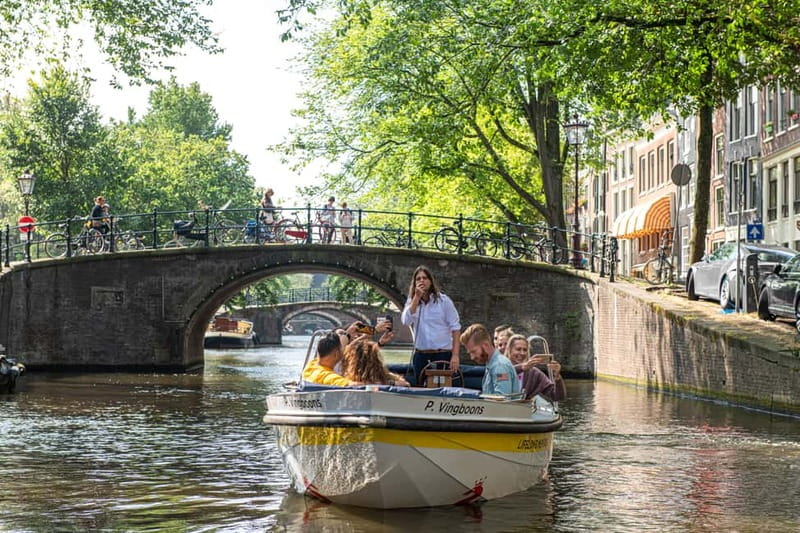 Amsterdam: Open Boat Tour of Canals with Expert Local Guide - Why an Open-Boat Canal Cruise Works So Well in Amsterdam